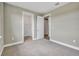 Bedroom with carpet flooring and access to closet at 15512 Greenwood Ave, Port Charlotte, FL 33981