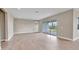 Bright living area with sliding glass doors to backyard at 15512 Greenwood Ave, Port Charlotte, FL 33981