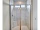 Large walk-in shower with tiled walls and seat at 15512 Greenwood Ave, Port Charlotte, FL 33981