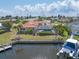 Property borders canal; features pool, boat, and dock at 1081 Coronado Dr, Punta Gorda, FL 33950