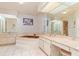 Bathroom with a large vanity and a brown jacuzzi tub at 1081 Coronado Dr, Punta Gorda, FL 33950