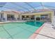 Inviting screened pool area with patio furniture and a covered lanai at 1081 Coronado Dr, Punta Gorda, FL 33950