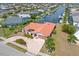 Aerial view of waterfront home with pool and boat dock at 1081 Coronado Dr, Punta Gorda, FL 33950