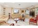 Spacious living area with light beige couches and wood coffee table at 1081 Coronado Dr, Punta Gorda, FL 33950