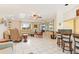 Open concept living area with a view into the kitchen and bar area at 1081 Coronado Dr, Punta Gorda, FL 33950