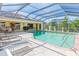 Relaxing pool area with patio and lounge chairs at 1081 Coronado Dr, Punta Gorda, FL 33950