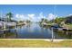 Scenic canal view with boats and lush landscaping at 1081 Coronado Dr, Punta Gorda, FL 33950