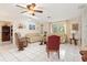 Bright living room featuring comfortable seating and a unique coffee table at 1081 Coronado Dr, Punta Gorda, FL 33950