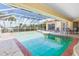 Enjoy this refreshing pool with screened enclosure at 1081 Coronado Dr, Punta Gorda, FL 33950
