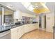 Bright kitchen with granite countertops and white cabinets at 1081 Coronado Dr, Punta Gorda, FL 33950