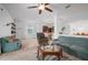 Bright living room featuring comfortable seating and a view into the kitchen at 4093 River Bank Way, Punta Gorda, FL 33980