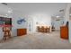 Open dining room with a view into the kitchen and living room at 4093 River Bank Way, Punta Gorda, FL 33980