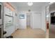 Kitchen features tile floors and a view into hallway at 4093 River Bank Way, Punta Gorda, FL 33980