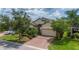 Beautiful one-story house with a brick driveway and well-manicured lawn at 4093 River Bank Way, Punta Gorda, FL 33980