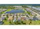 Aerial view of a home with a pool in a quiet neighborhood at 4093 River Bank Way, Punta Gorda, FL 33980
