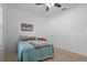 Cozy bedroom with a full-size bed and ample closet space at 4093 River Bank Way, Punta Gorda, FL 33980