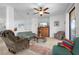 Cozy living room with comfortable seating and a large flat-screen TV at 4093 River Bank Way, Punta Gorda, FL 33980