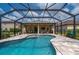 Escape to your own private oasis with this screened-in pool at 4093 River Bank Way, Punta Gorda, FL 33980