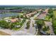 Aerial view of community entrance and landscaping at 4093 River Bank Way, Punta Gorda, FL 33980