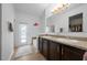 Bathroom boasts double sinks, a soaking tub, and an updated vanity at 4093 River Bank Way, Punta Gorda, FL 33980