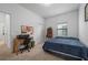 Bedroom with a desk, chair, and full size bed at 4093 River Bank Way, Punta Gorda, FL 33980