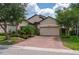 Two-story house with brick pavers driveway and landscaping at 4093 River Bank Way, Punta Gorda, FL 33980