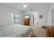 Spacious bedroom with large bed, dresser, and plenty of natural light at 4093 River Bank Way, Punta Gorda, FL 33980