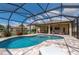 Relax and unwind in your private screened-in pool area at 4093 River Bank Way, Punta Gorda, FL 33980