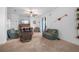 Cozy living room featuring comfortable seating and a large TV at 4093 River Bank Way, Punta Gorda, FL 33980