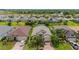 Aerial view of a single-Gathering home with a pool in a residential neighborhood at 4093 River Bank Way, Punta Gorda, FL 33980