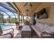 Relax on the comfortable patio furniture by the pool at 4093 River Bank Way, Punta Gorda, FL 33980