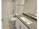Clean bathroom with granite countertop and bathtub at 9267 Waldrep St, Port Charlotte, FL 33981