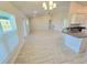 Large living room with vaulted ceilings and plenty of natural light at 9267 Waldrep St, Port Charlotte, FL 33981