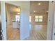 Bright and spacious entryway leading to the living room and kitchen at 9267 Waldrep St, Port Charlotte, FL 33981