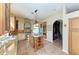 Spacious kitchen featuring granite countertops, custom cabinetry, and island at 2125 Ryan Blvd, Punta Gorda, FL 33950