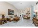 Relaxing living room with comfortable seating and access to the patio at 16446 Belo Ct, Punta Gorda, FL 33955