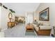 Bright and airy living room with comfortable seating and views to dining area at 16446 Belo Ct, Punta Gorda, FL 33955