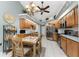 Well-equipped kitchen boasting ample cabinetry, stainless steel appliances, and breakfast nook at 16446 Belo Ct, Punta Gorda, FL 33955