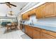 Open kitchen with stainless steel appliances and breakfast nook at 16446 Belo Ct, Punta Gorda, FL 33955