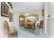Bright dining area featuring a wood table and chairs at 16446 Belo Ct, Punta Gorda, FL 33955