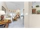 Spacious living room with ample natural light, comfortable furniture, and tiled floors at 16446 Belo Ct, Punta Gorda, FL 33955