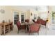 Cozy patio with wicker furniture, perfect for outdoor dining at 16446 Belo Ct, Punta Gorda, FL 33955
