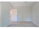 Simple bedroom with hardwood floors and open door at 8191 Strasse Blvd, Punta Gorda, FL 33982