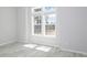 Spacious bedroom with hardwood floors and large windows at 8191 Strasse Blvd, Punta Gorda, FL 33982