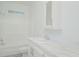 Clean bathroom with white vanity and bathtub at 8191 Strasse Blvd, Punta Gorda, FL 33982