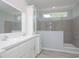 Spacious bathroom with double vanity and large walk-in shower at 8191 Strasse Blvd, Punta Gorda, FL 33982