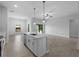 Bright kitchen with island sink, stainless dishwasher and appliances and eat-in dining area at 2049 Delta St, Port Charlotte, FL 33952