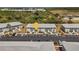 Aerial view showcasing condo building and parking at 3310 Loveland Blvd # 1502, Punta Gorda, FL 33980