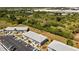 Aerial view of a condo community with ample parking and surrounding natural landscape at 3310 Loveland Blvd # 1502, Punta Gorda, FL 33980