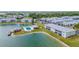 Aerial view of condo community pool and lake at 3310 Loveland Blvd # 1502, Punta Gorda, FL 33980